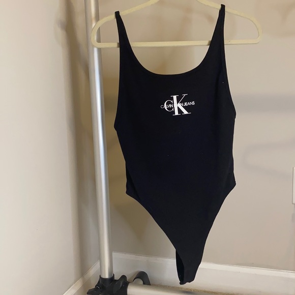 Calvin Klein Tops - Black Calvin Klein bodysuit brand new without tags size medium would fit a large